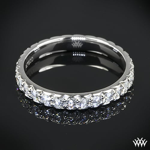 This exquisite Custom Diamond Wedding Ring is set in platinum and holds 