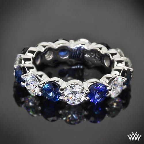 Full of color this custom Sapphire and Diamond Wedding Band begs to be