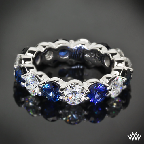 Full of color this custom Sapphire and Diamond Wedding Band begs to be 