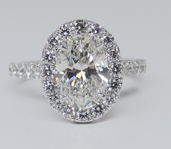Oval micropave diamond engagement ring harry winston