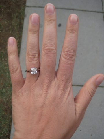 Emerald cut diamond engagement ring thin band