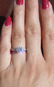 Ring Sparkle on Hand2.gif