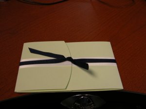 closednvelopeondeskwithribbon.JPG