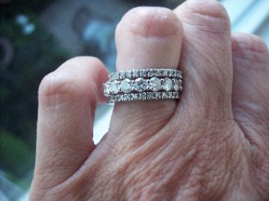eternity bands with shared prong.jpg