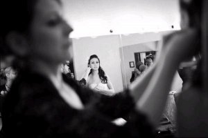 wedding miracles putting earrings on.jpg