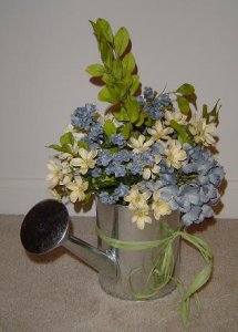 wateringcanflowers.JPG wateringcanflowers.JPG