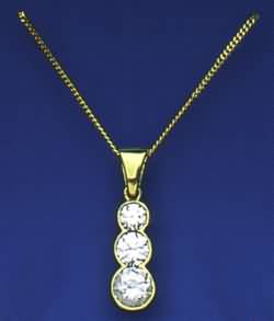 3 stone round bezel.jpg