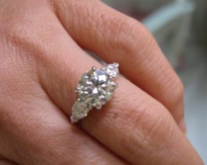 My 3-stone ring pear sides.jpg
