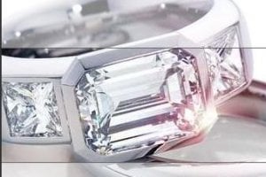 Emerald Bezel Ring with Princess cuts.JPG Emerald Bezel Ring with Princess cuts.JPG