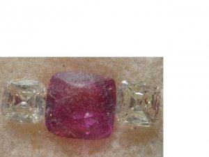purplish pink sapphire with cushion sides.jpg