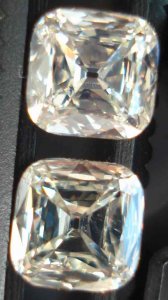.67ctw cushion pair.JPG