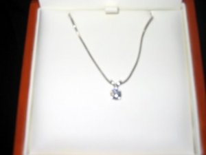 .65 ct wg solitaire wedding gift.JPG