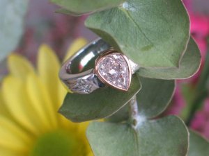 1.02ct Pink Pear ring with kites.jpg