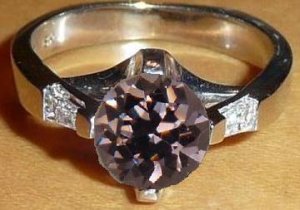 18kt WG swoopy RB setting with grey spinel.jpg
