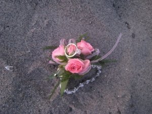 ringflowerpinkrosecorsage.jpg