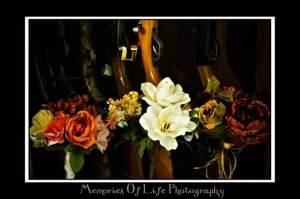 bouquets in front of gun case.jpg