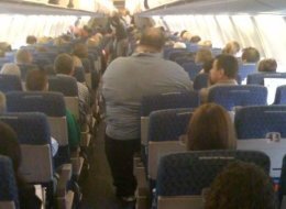 s-OBESE-MAN-ON-AMERICAN-AIRLINES-large.jpg