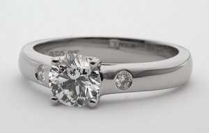 0.87 carat RB in cross prong setting.jpg