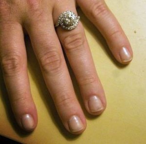 engagement ring on my finger.jpg