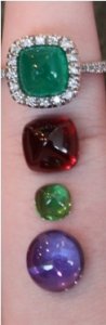 Swala cabs with emerald ring.jpg