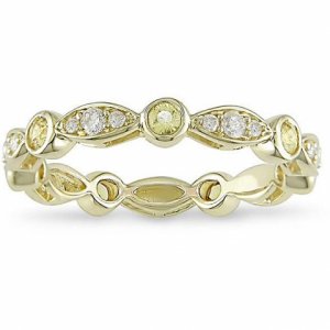 in yellow gold swing ring.jpg