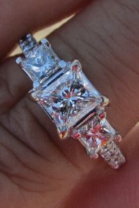 3 stone princess diamond ring.jpg