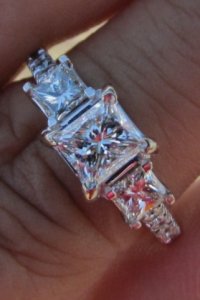 3 stone princess diamond ring.jpg 3 stone princess diamond ring.jpg