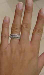 10 stone ring with wedding rings.jpg