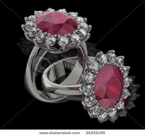 stock-photo-ruby-and-diamond-cluster-rings-on-black-24252199.jpg