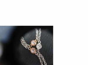 Necklace through loupea.jpg