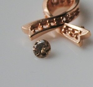 Side stone with 18k rose gold.jpg Side stone with 18k rose gold.jpg