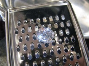 Silvery topaz on grater.jpg