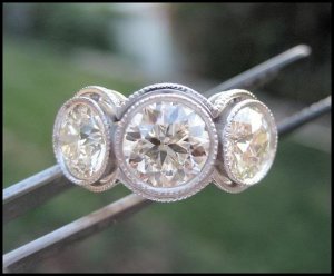 Tradergirl's 3 stone double bezel.jpg