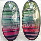 12.96 and 4.1cts.Cab. set polychromatic tourmaline.jpg