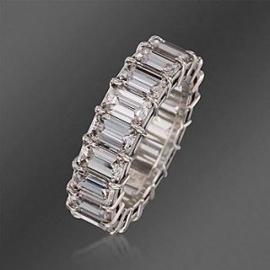 Kwiat 8.95ct 19 stone EC eternity band Side View.jpg Kwiat 8.95ct 19 stone EC eternity band Side View.jpg