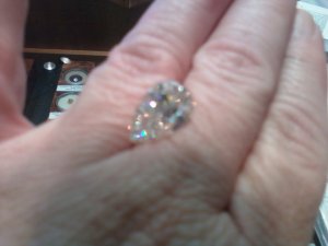 Pear shaped diamond on hand.jpg