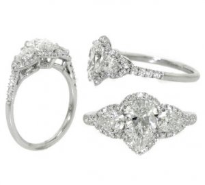 Pear halo three stone.jpg