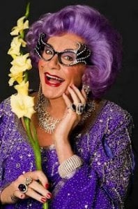 Dame Edna with gladiolus.jpg