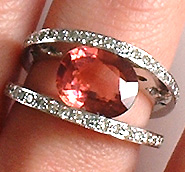 red_tourmaline_ring_on_finger_1.jpg