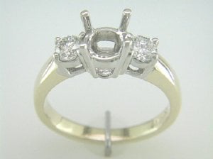 3 stone ring regular prongs.jpg