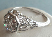 18k french cut bezel ring.png