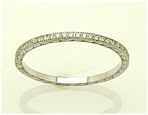 1.3mm bead set eternity band.jpg