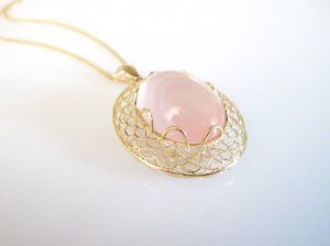 ovalrosequartzpendant.jpg
