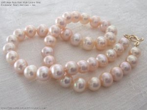 1885_huge_pale_pink_high_lustre_oval_freshwater_pearl_necklace.jpg