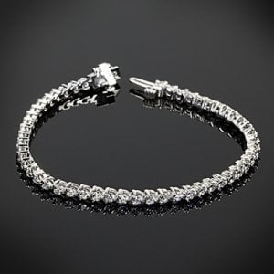 three-prong-martini-diamond-tennis-bracelet-in-18k-white-gold-by-whiteflash_35905_f-2__1_.jpg