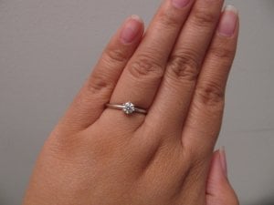 0.5 carat diamond shop ring on hand