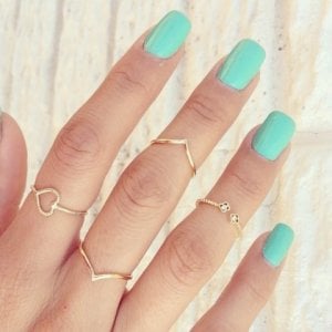 gold-midi-rings-with-blue-nails.jpg