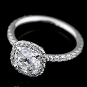 cushion-cut-micro-pave-engagement-rings-on-hand-close-up-43.jpg