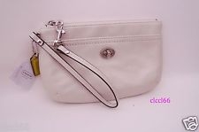 coachivorypinkwristlet.jpg