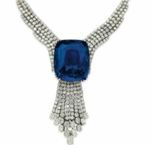blue-belle-of-asia-with-diamond-tassel-pendant-suspended-from-it-in-a-diamond-necklace.jpg
